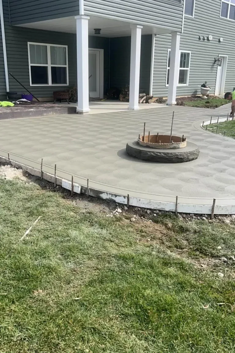 backyard concrete patio and firepit in brooksville florida